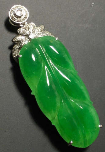 A GREEN JADEITE CARVED LEAF PENDANT, TYPE A