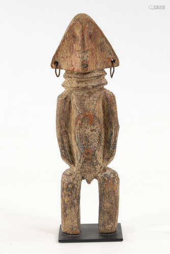 Alte afrikanische Ahnenfigur.Holz mit Resten von Farbfassung. Jüngere Standplatte. H 31 cm.