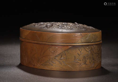 A FLOWER AND BIRD CARVED- OVAL SHAPED  BRONZE BOX