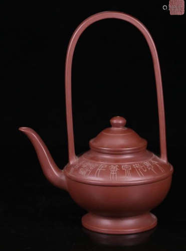 A CALLIGRAPHY CARVED ZISHA TEA POT