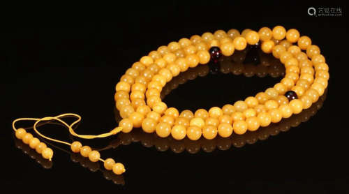 A 108 AMBER BEADS NECKLACE