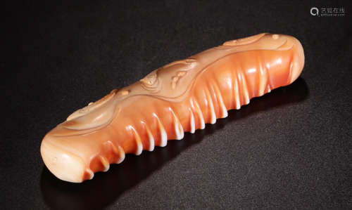A TRIDACNA STONE FISH CARVED ORNAMENT