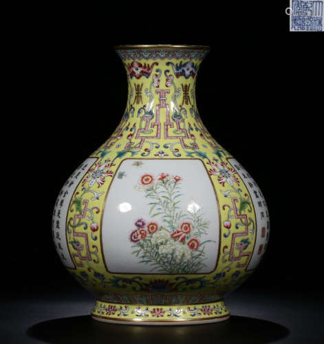 A QIANLONG MARK FAMILLE ROSE YELLOW BACK GROUND  FOLWER PATTERN VASE