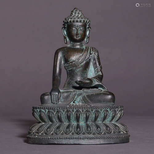 A BRONZE GUATAMA BUDDHA