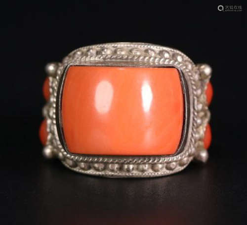 A CORAL EMBEDDED SILVER RING