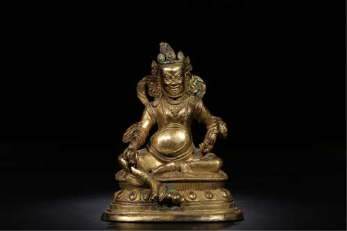 TIBETAN GILT BRONZE SEATED YELLOW JAMBHALA