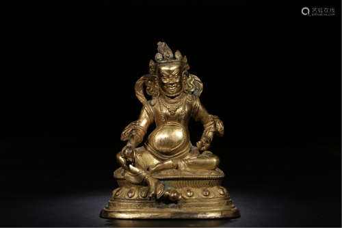 TIBETAN GILT BRONZE SEATED YELLOW JAMBHALA