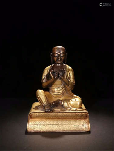 CHINESE PARTLY GILT SEATED BUDDHA