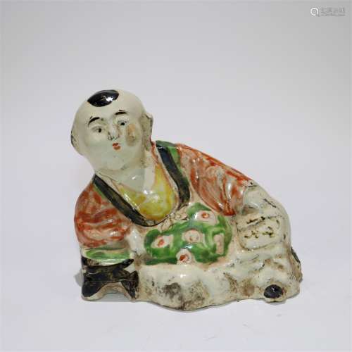 A Chinese Red and Green Glazed Porcelain Figure of Boy