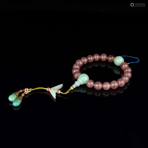 A Chinese Carved Tourmaline Prayers Beads