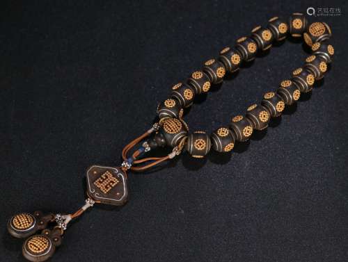 A Chinese Carved Agarwood Prayers Beads with Gilt Silver Inlaided