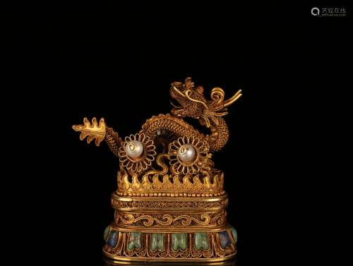 A Chinese Gold Decoration