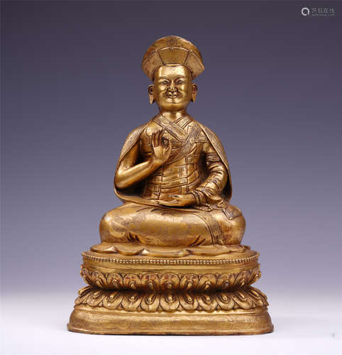 TIBETAN GILT BRONZE SEATED GURU