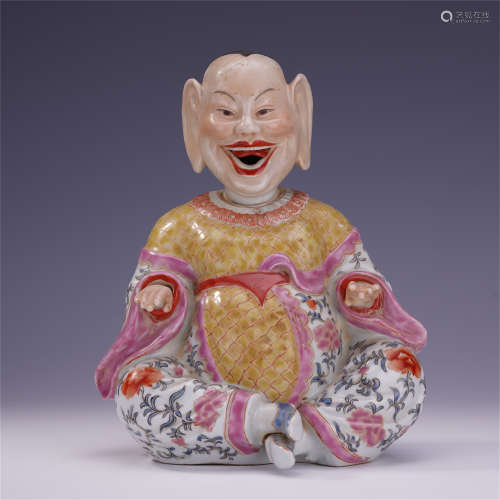 CHINESE PORCELAIN FAMILLE ROSE SEATED FIGURE