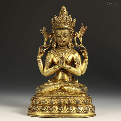 CHINESE GILT BRONZE SEATED FOUR ARM GUANYIN