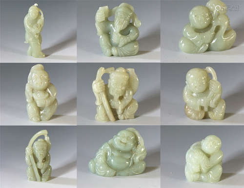 NINE CHINESE CELADON JADE FIGURES