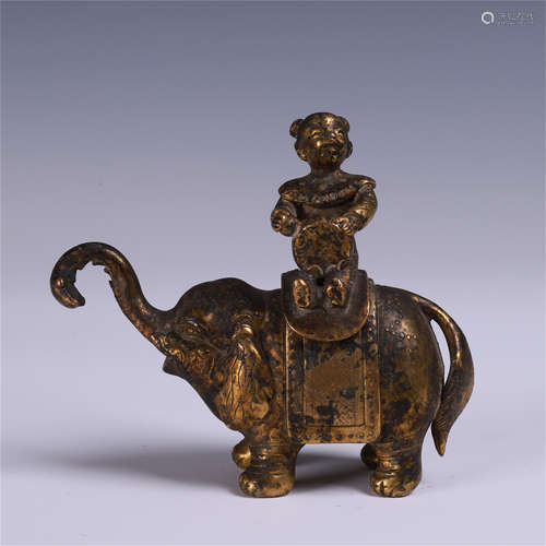 CHINESE GILT BRONZE BOY ON ELEPHANT TABLE ITEM