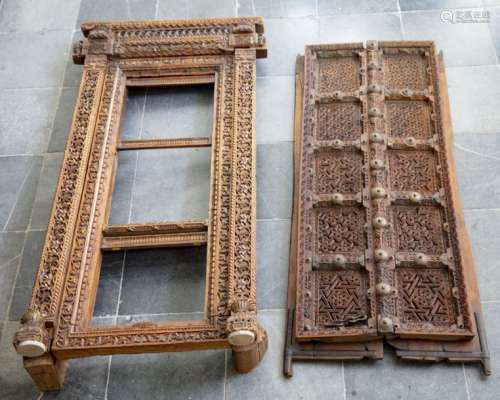 A Pair of wood Doors and frame