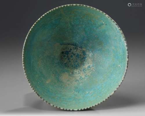 An Islamic turquoise glazed bowl