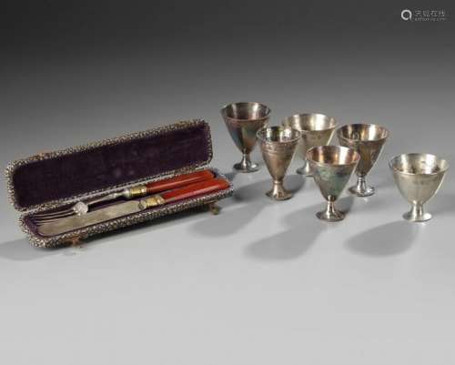 A lot of six Islamic silver cups and a box contain…