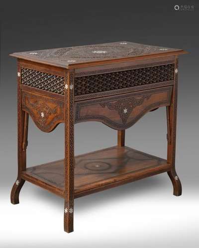 A syrian wooden table inlaid with mother of pearl