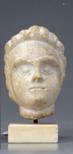 A Roman marble relief head of a youth