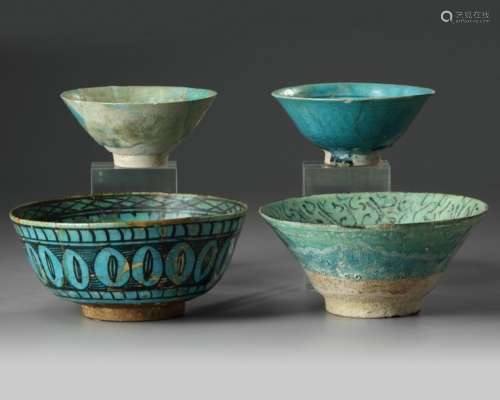 Four Islamic turquoise glazed bowls
