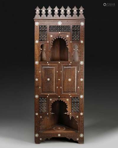 An Islamic wooden corner cabinet