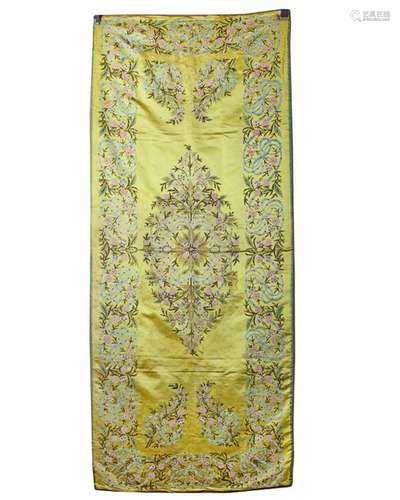 An Islamic yellow silk wrapping cloth