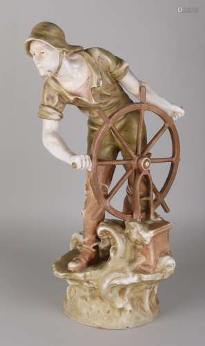 Antiek keramieken figuur, Visser aan stuurwiel
