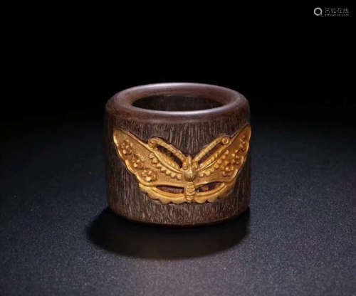 A CHENXIANG WOOD SILVER GILTED BUTTERFLY THUMB RING