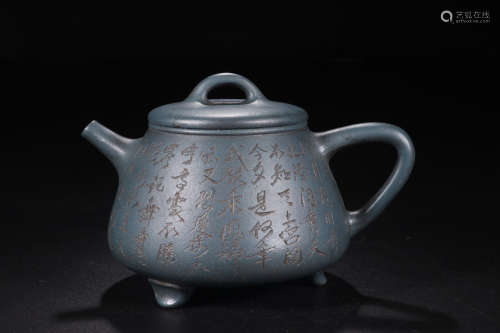 A ZISHA TEAPOT WITH POETRY CARVING