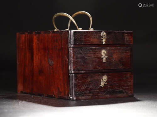A RED WOOD JEWELRY  BOX