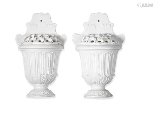 A pair of Mennecy white wall-sconces or bouquetières, circa 1760