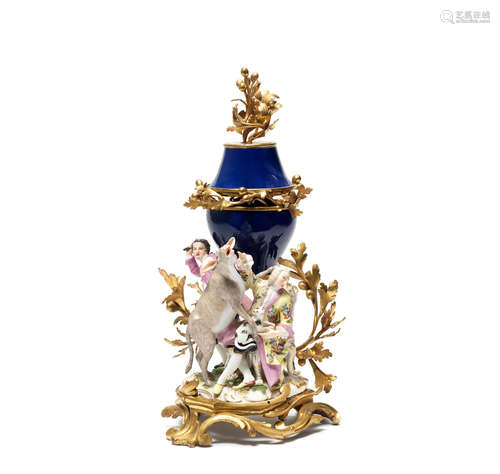 An ormolu-mounted Meissen satirical group, circa 1760