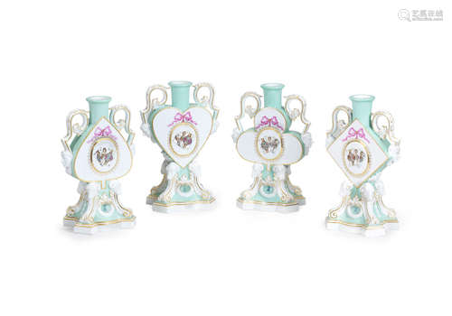 A very rare set of four Meissen playing card candlesticks, dated 1876