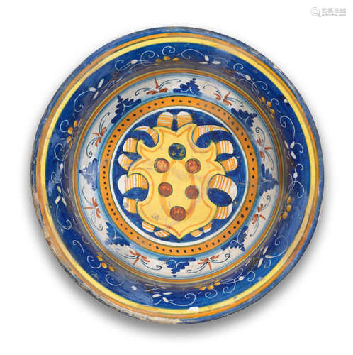 A Tuscan, Montelupo or Cafaggiolo, maiolica large bowl with the Medici coat of arms, circa 1540