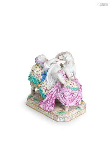 A Meissen group of a child and a dog (