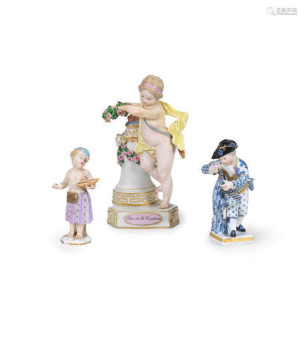 A Meissen figure of a putto, together with two small Meissen figures, late 19th century