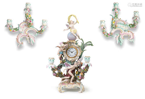 A Meissen clock case, together with a pair of Meissen wall sconces, 19th century