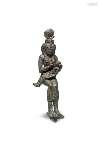 An Egyptian bronze figure of Isis and Horus