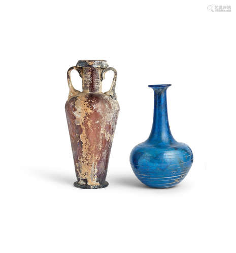 A Roman blue glass bottle and a Roman aubergine glass amphoriskos  2