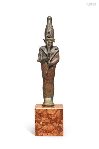 An Egyptian gilt bronze figure of Osiris