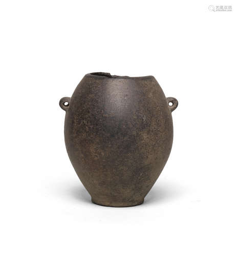 An Egyptian basalt jar