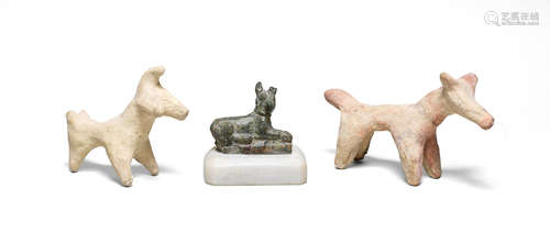 Two Cypriot terracotta dogs and a Roman bronze dog  3