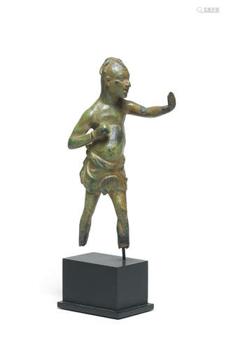 A Greek bronze statuette of a boxer