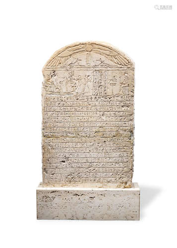 An Egyptian limestone round-topped stele for Padi-Bast