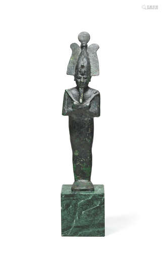 An Egyptian bronze figure of Osiris