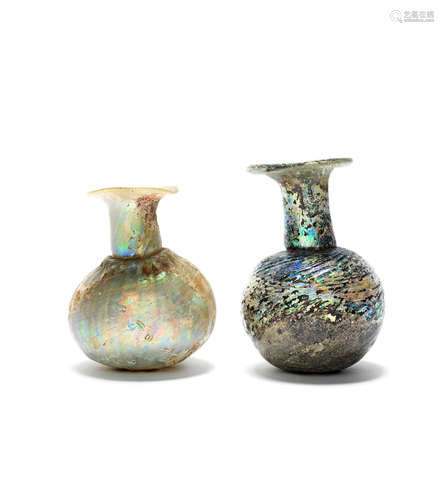 Two Roman green glass sprinkler flasks  2