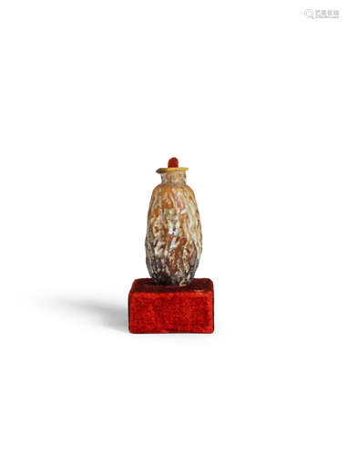 A Roman amber glass date flask